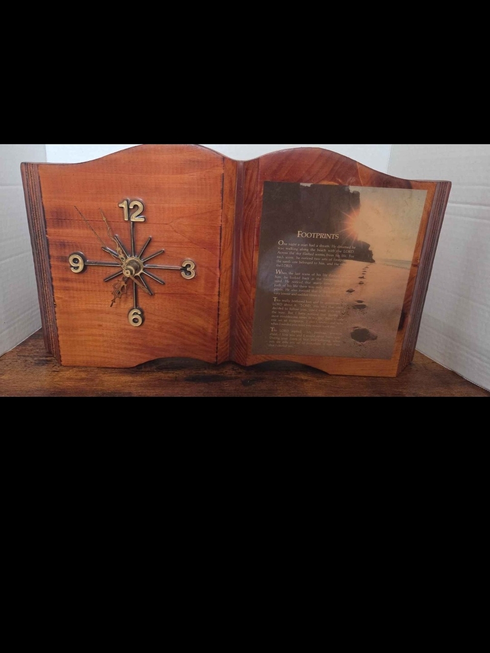 vintage 1980s or 1990s wooden clock shaped like an open book, "Footprints"